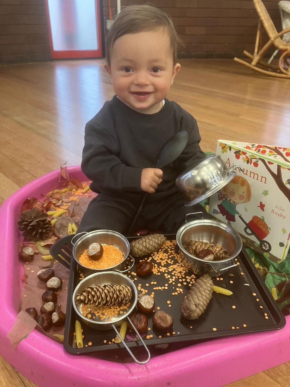 Infant autumn tuff tray sensory play at ME Montessori Nursery Aylesbury